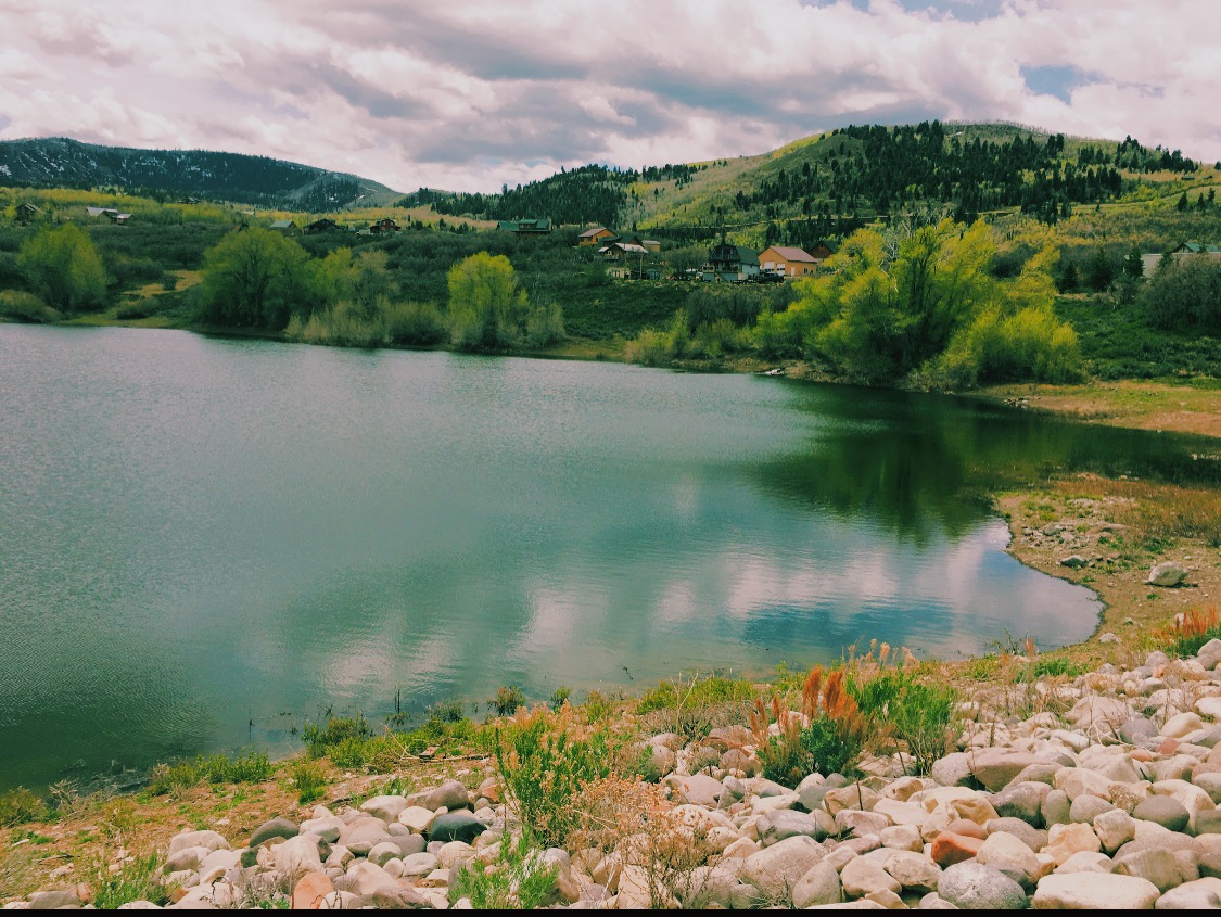 Lake Creek pond with mountains behind